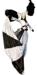 Elegant Black and White stilt walking character. Please quoyte here6.