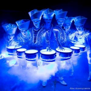 Spectacular illuminated drumming act. Click for more...