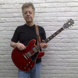 Mike Piggott with Gibson guitar